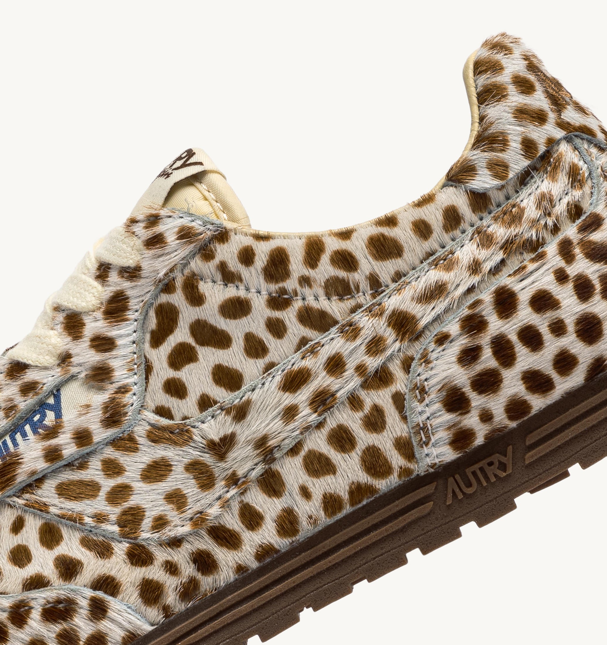 SNEAKERS WINDSPIN EFFETTO CAVALLINO STAMPA ANIMALIER