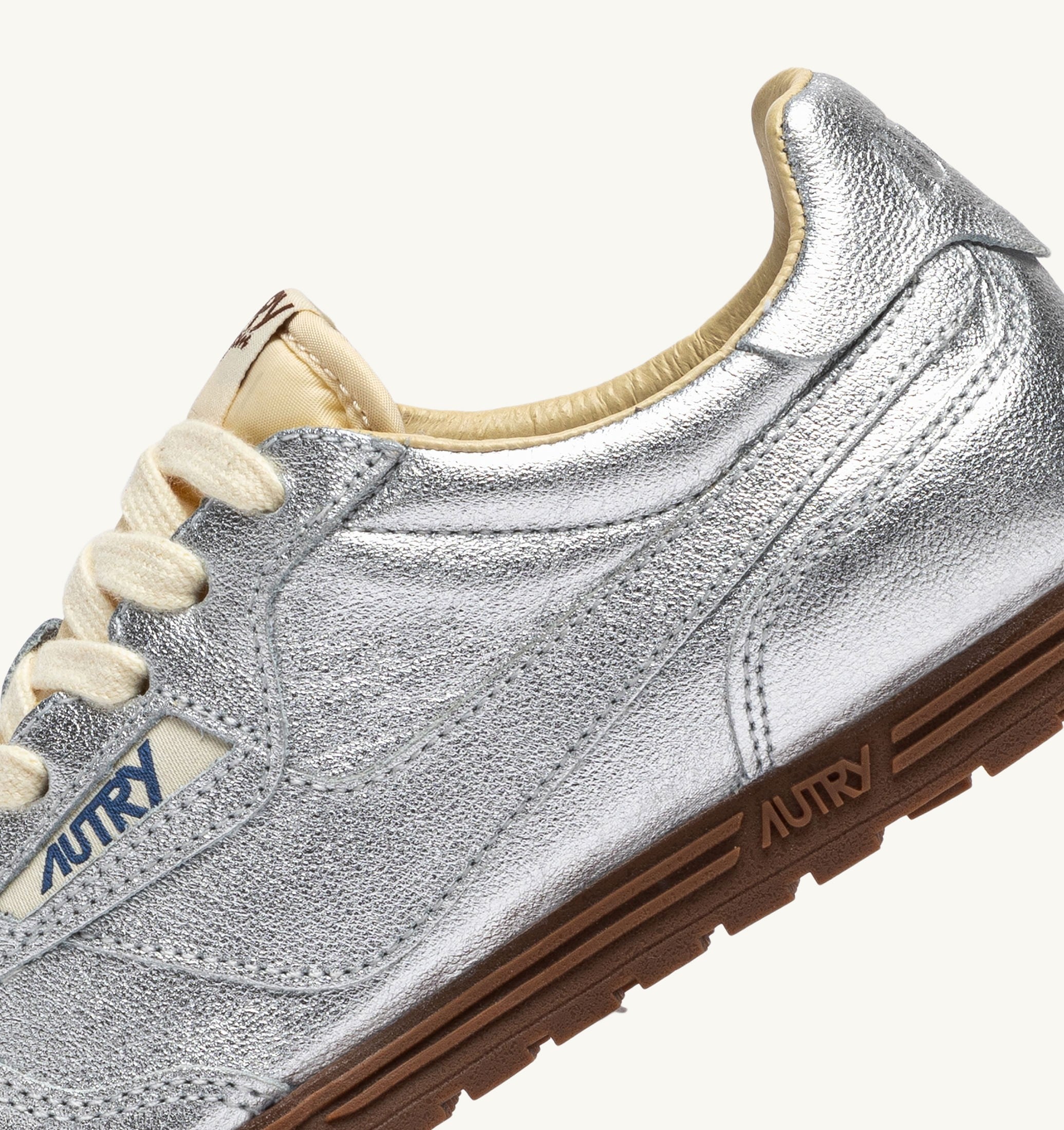 SNEAKERS WINDSPIN IN PELLE LAMINATA ARGENTO